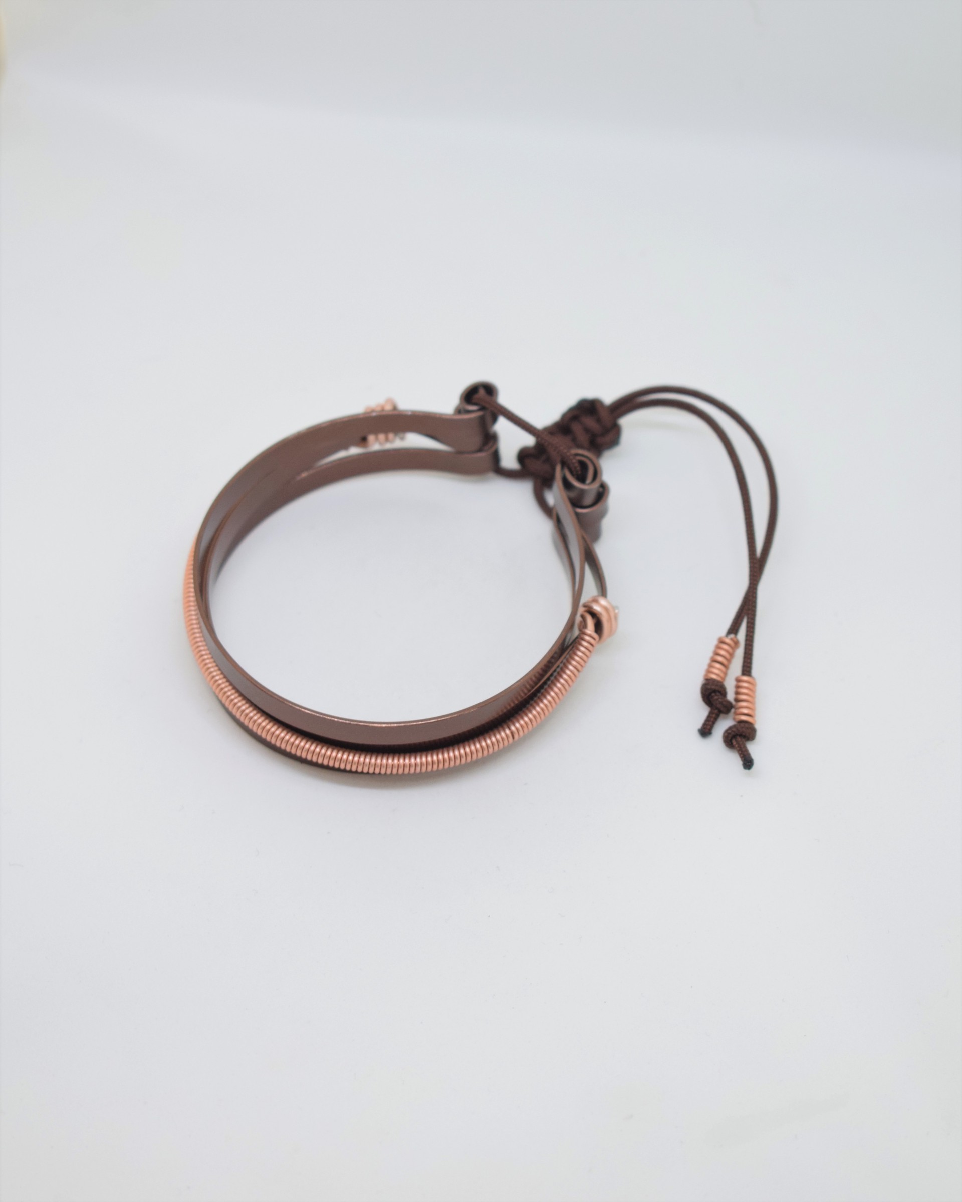 Βραχιόλι καφέ με rose gold σπιράλ