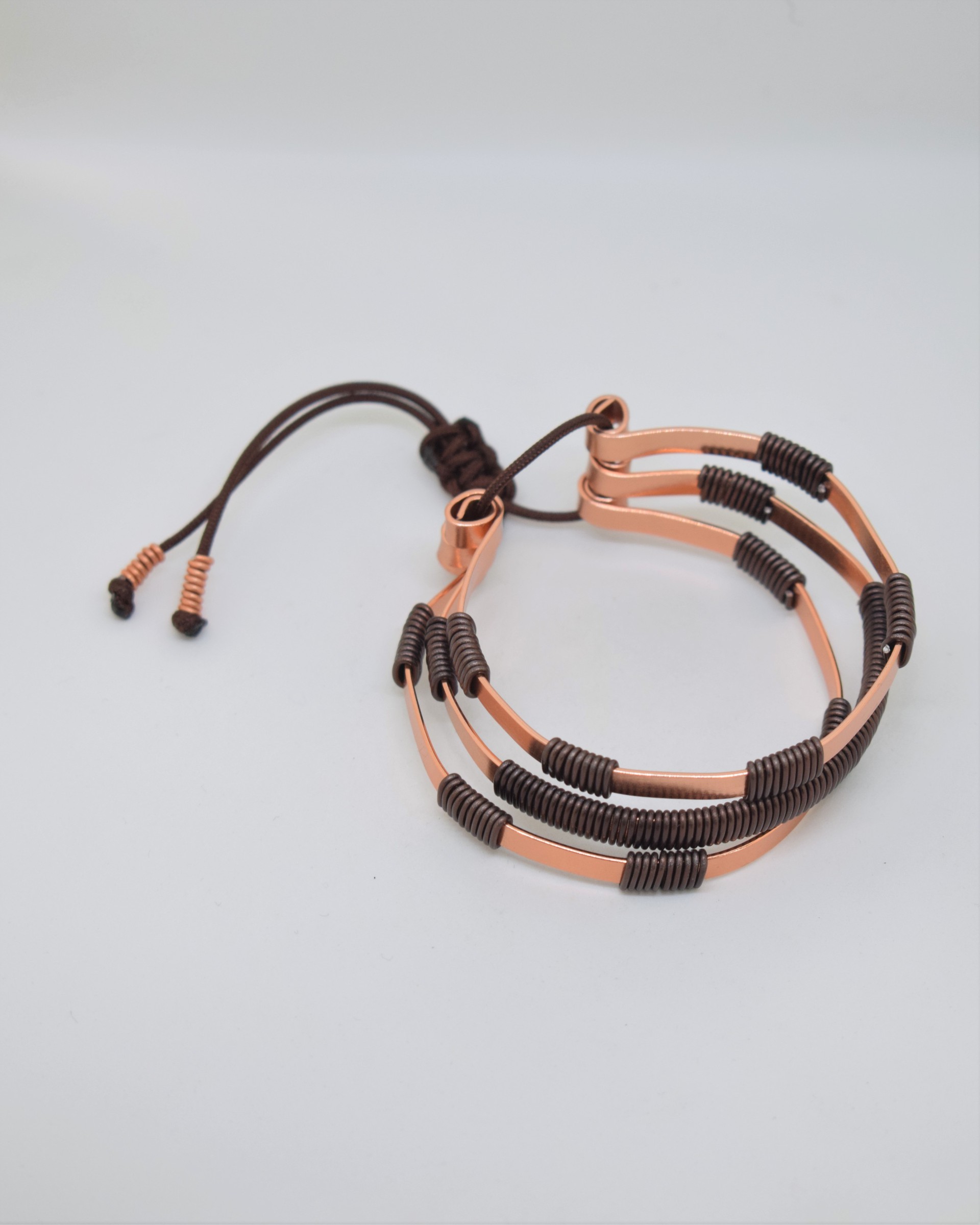 Βραχιόλι rose gold με καφέ σπιράλ 