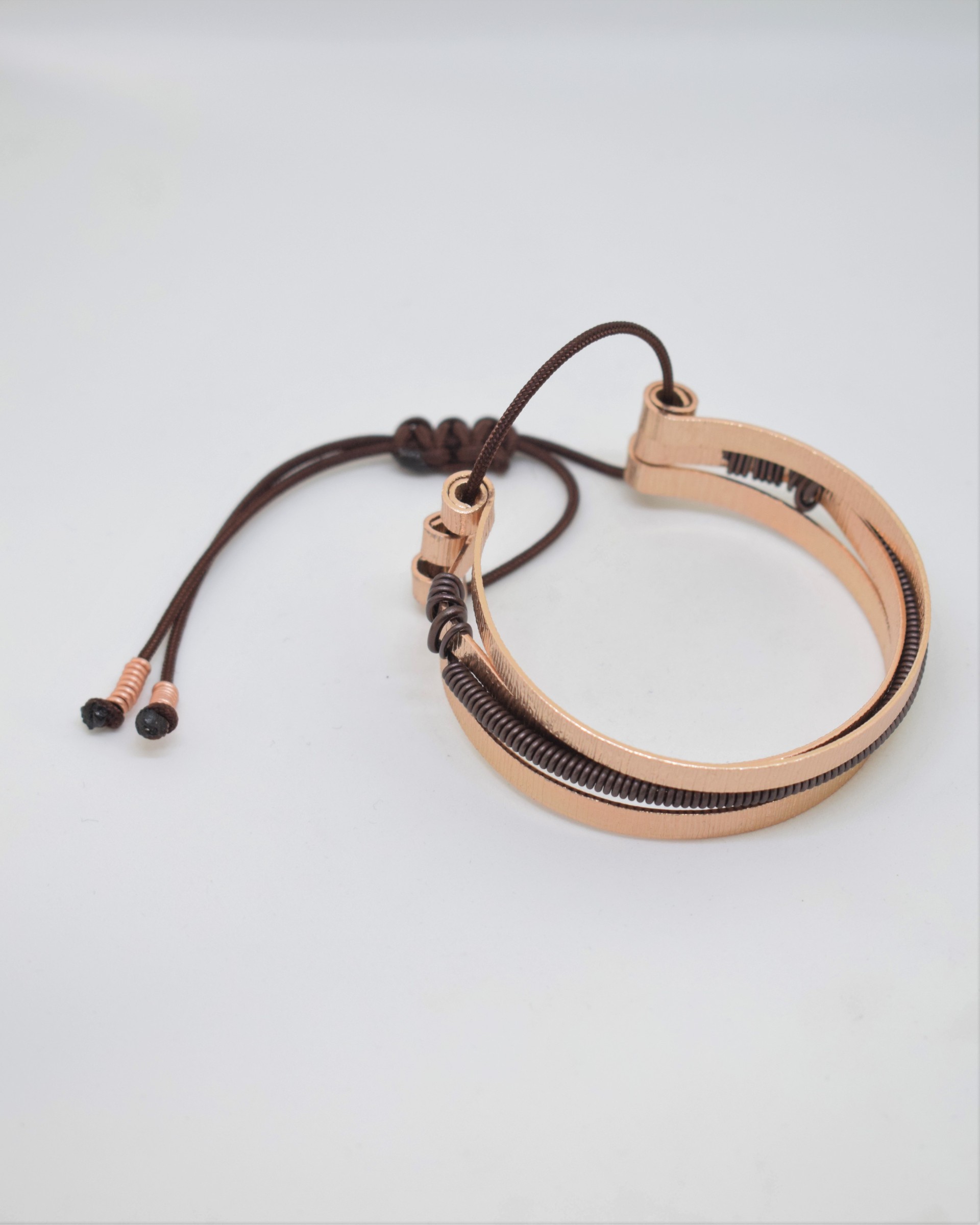 Βραχιόλι rose gold με καφέ σπιράλ 