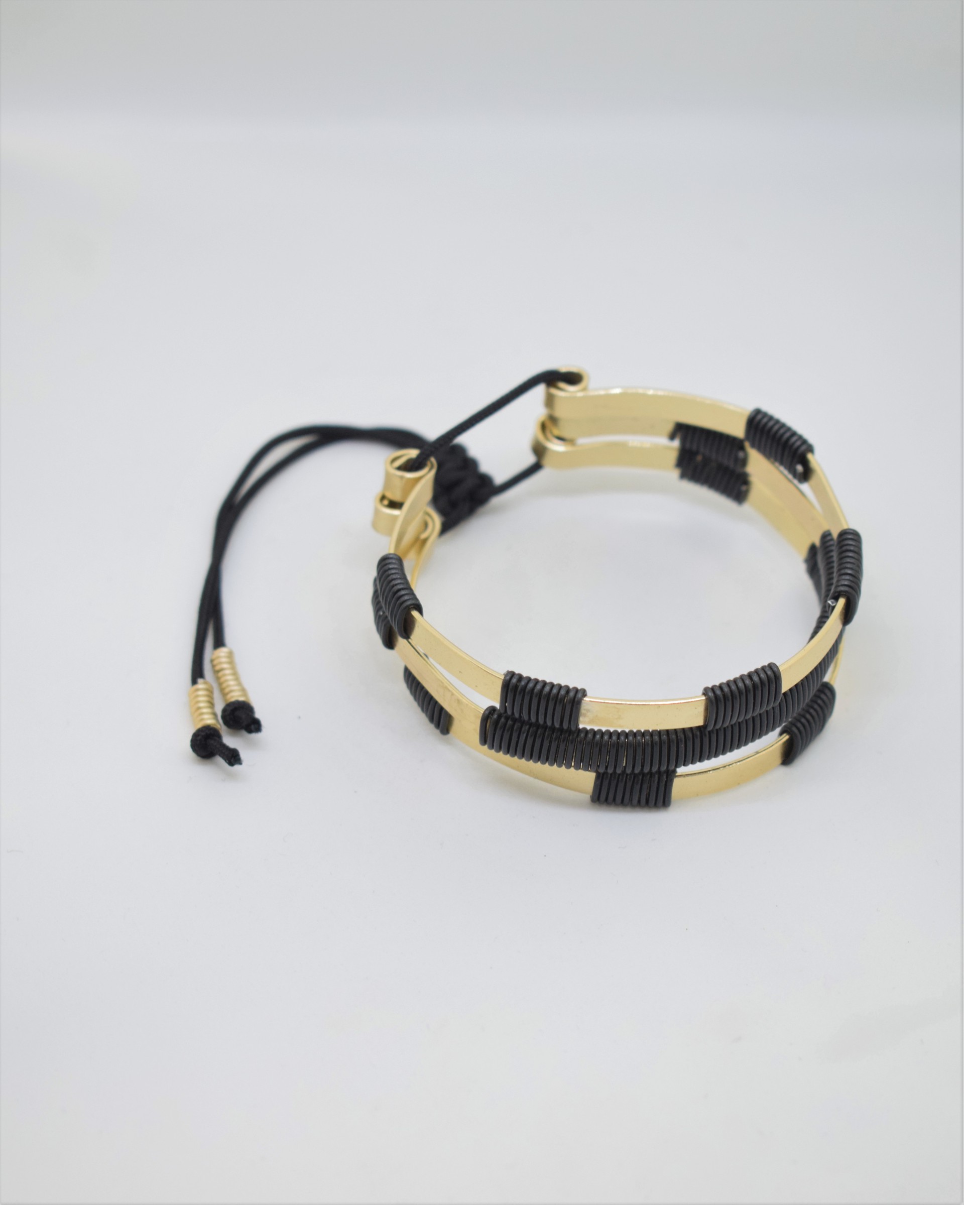 Βραχιόλι light gold με μαύρα σπιράλ