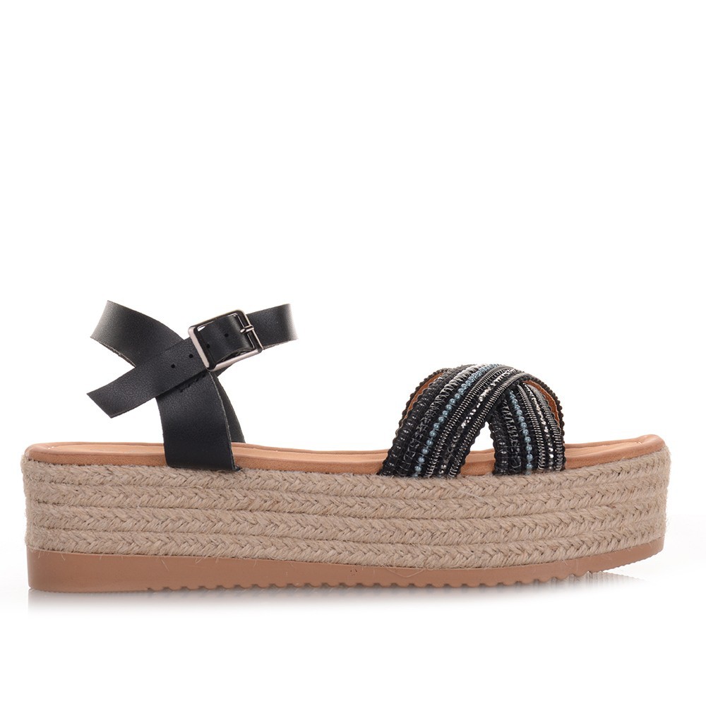 Flatforms σε μαύρο χρώμα με χιαστί φάσα Famous